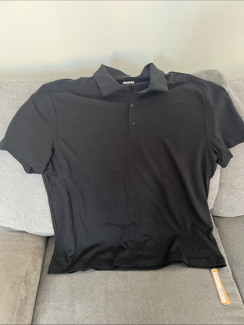 SKIMS Men's Black Polo with Three-Button Placket - Picture 1 of 3